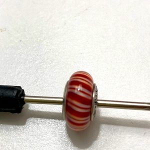 Retired Red and White Stripe Glass Charm